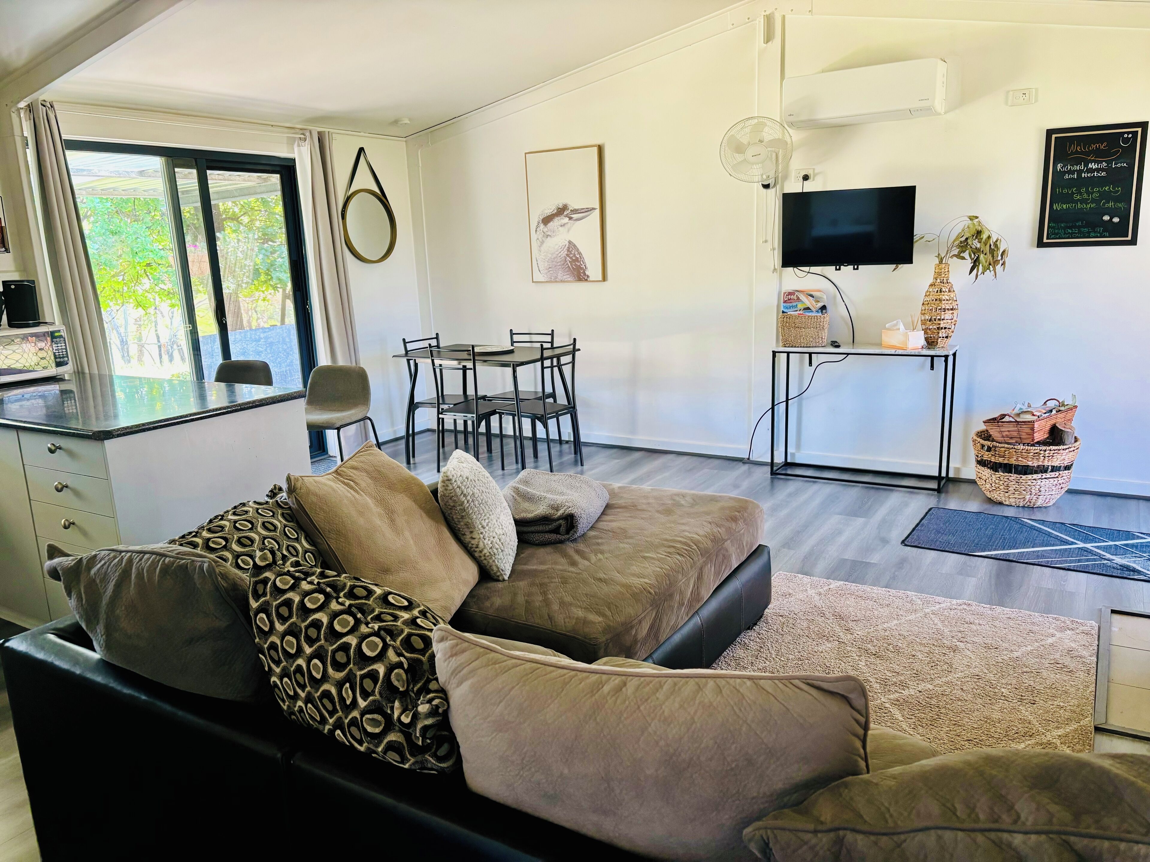 Smart TV, fireplace, books, stereo