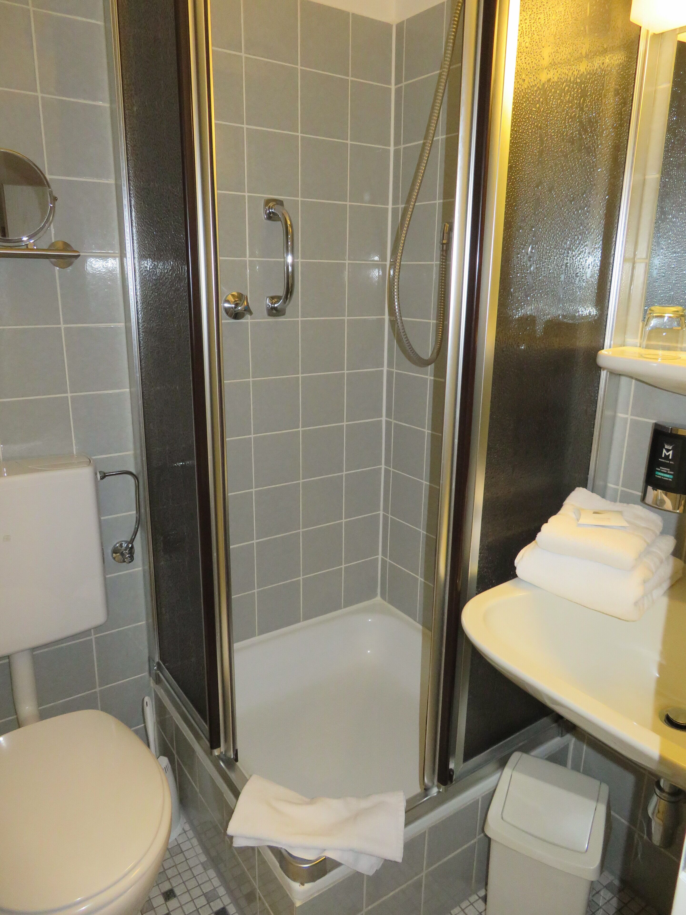 comfort single room | bathroom | shower, hair dryer, towels