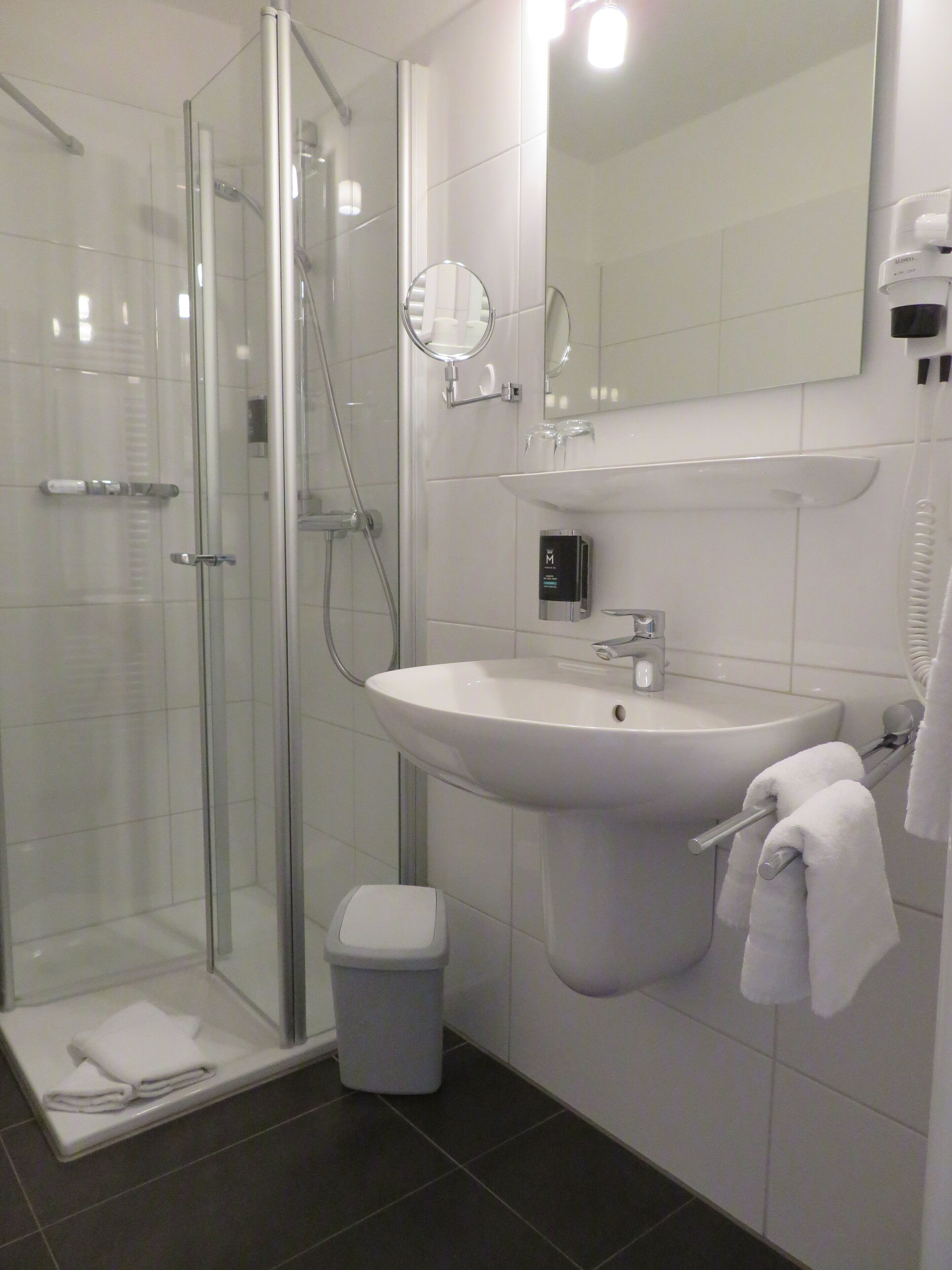 standard double room | bathroom | shower, hair dryer, towels