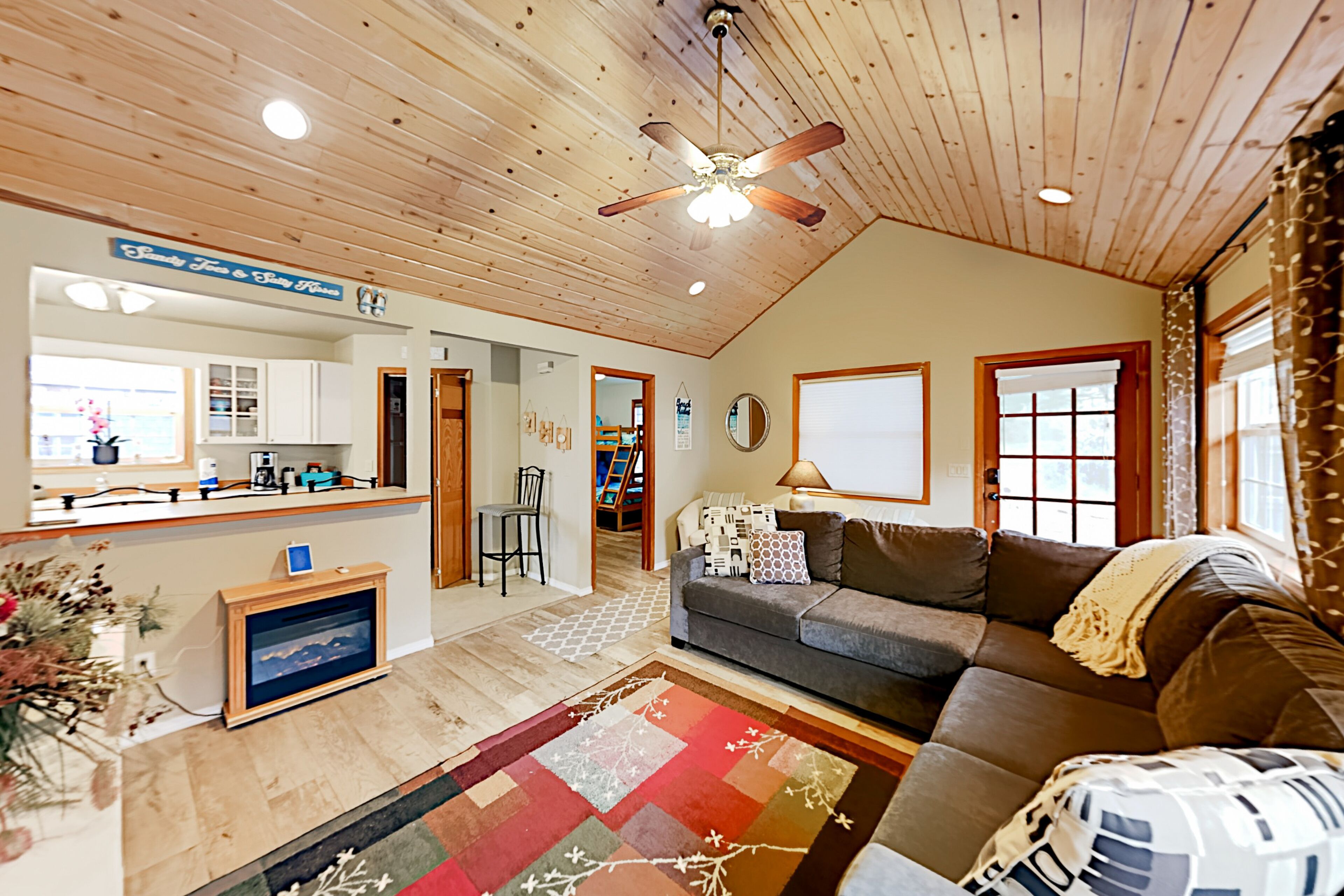 Three-suite charmer with wraparound deck, grill & firepit - walk to beach