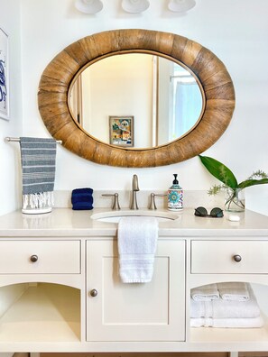 Bathtub, hair dryer, towels, soap