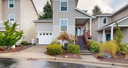 Modern Ocean Highlands home with Netarts Bay & ocean views, fireplace - dogs OK