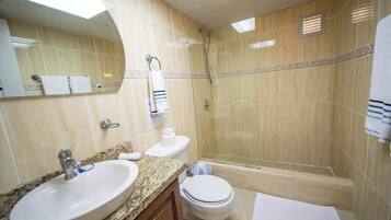 Shower, towels, soap, toilet paper