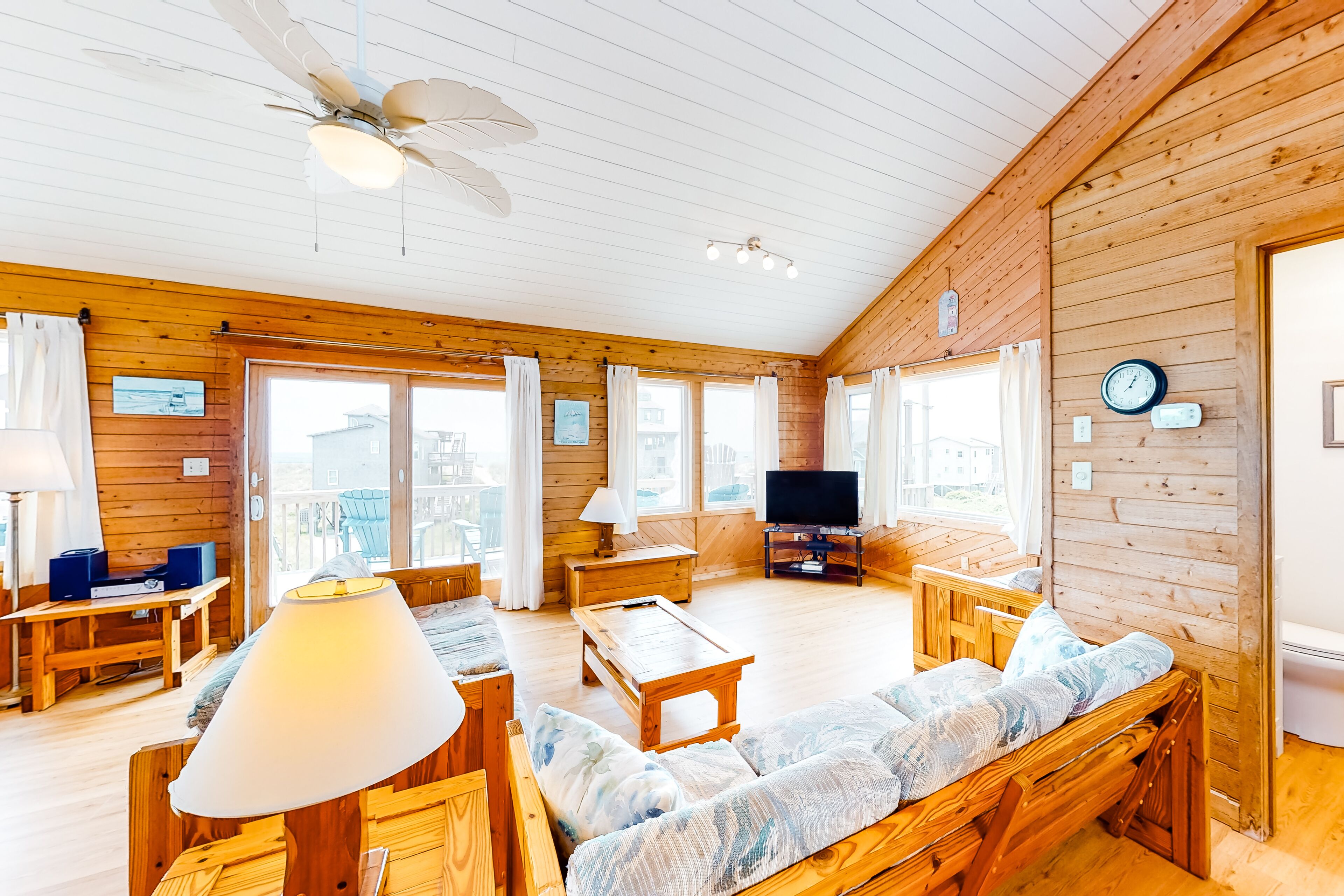 Gorgeous home one row back from beach with central AC, WiFi, ocean views, & deck