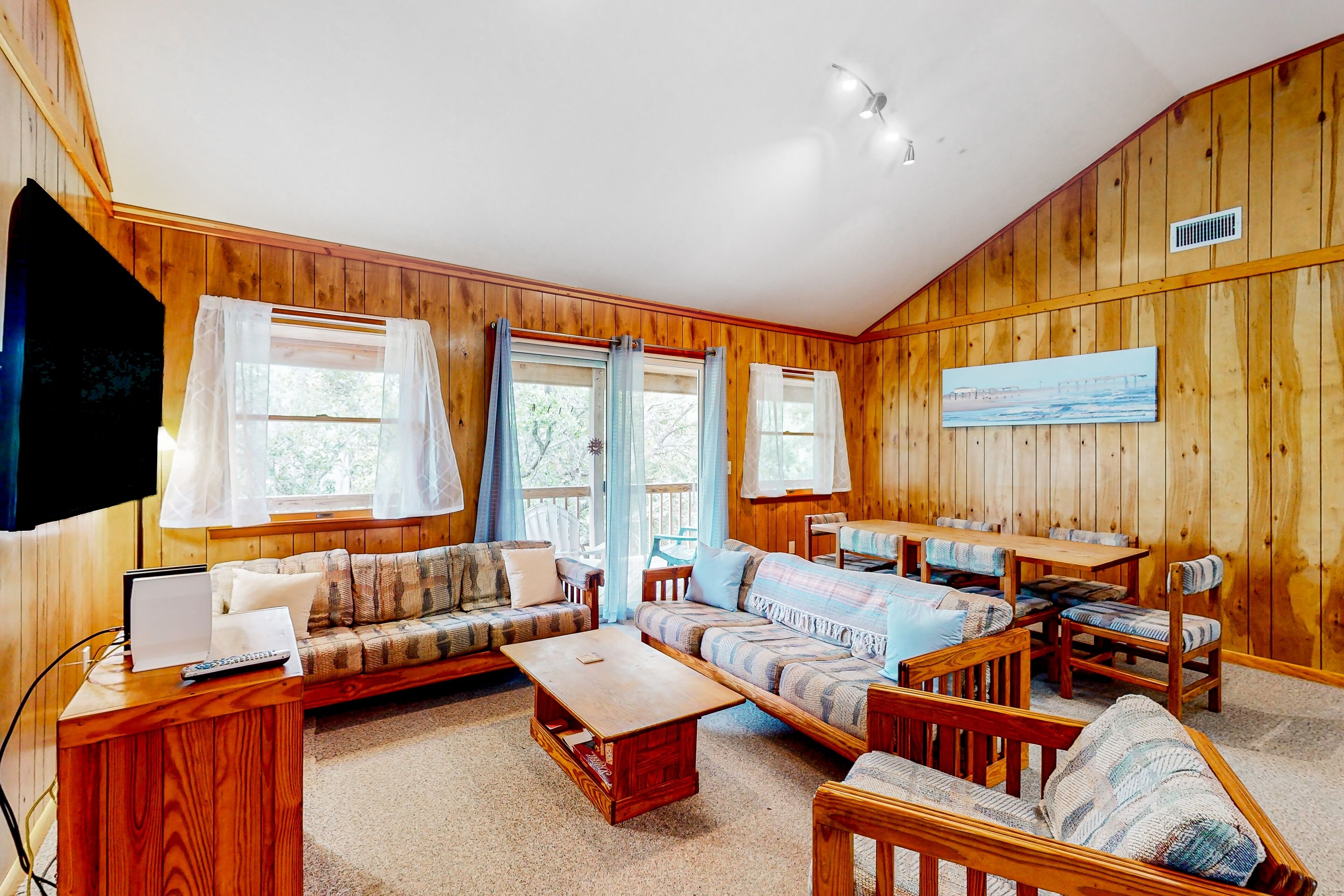 Quiet lake-view home with shaded deck & yard - near beach, dining, & bike rental