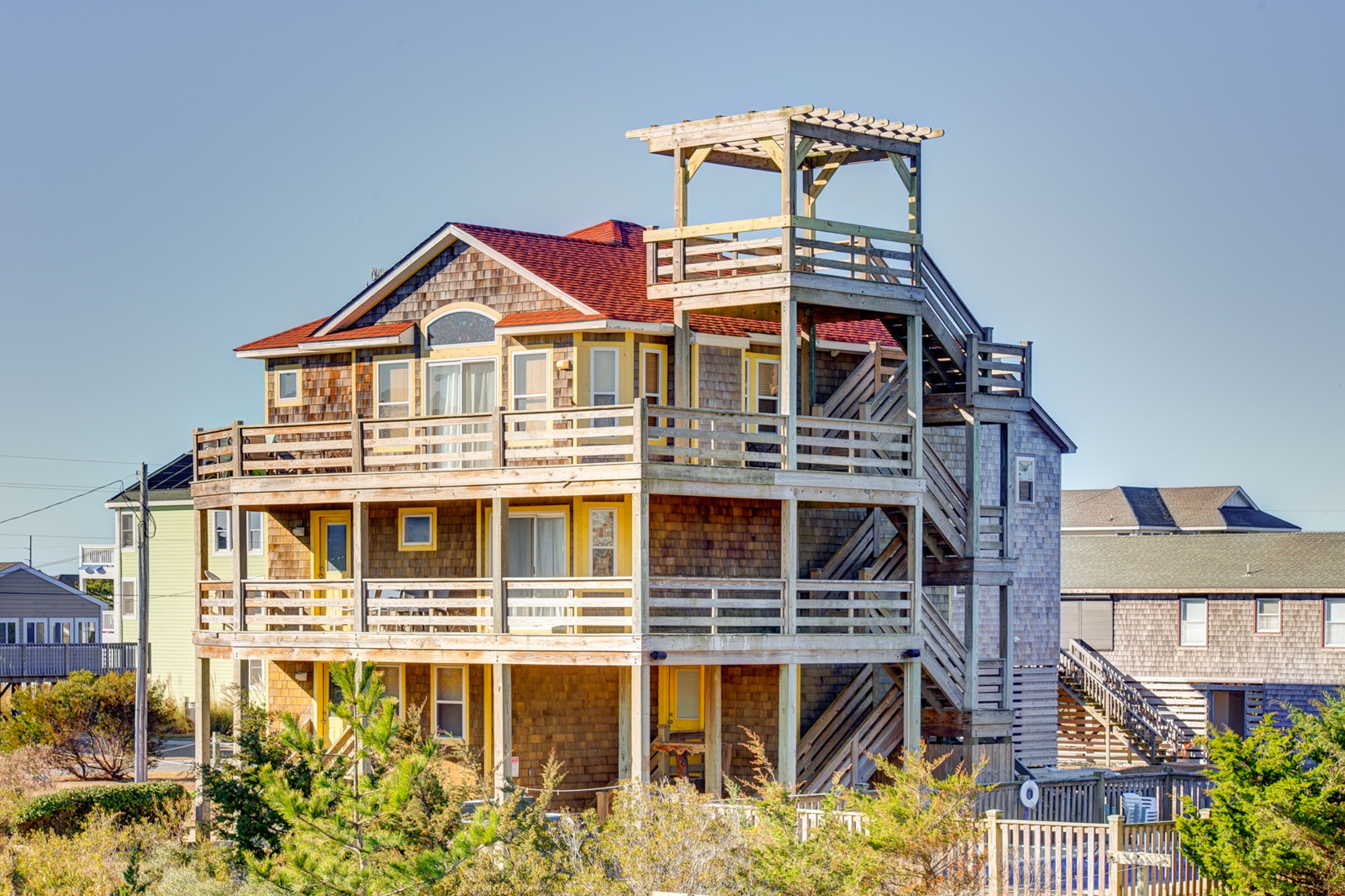 Ocean view home with private pool, hot tub, two wraparound decks, & central AC