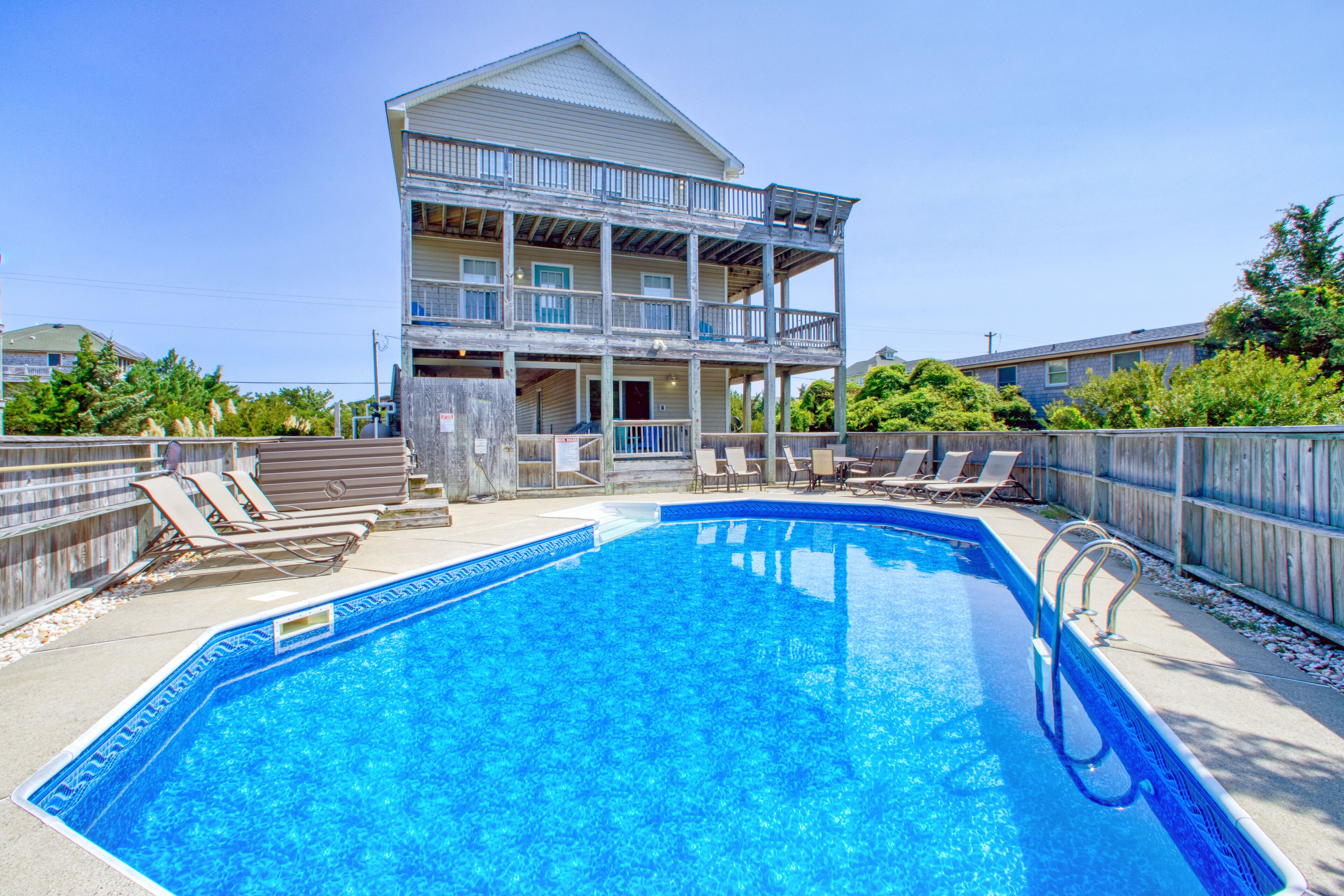 Friendly home with private hot tub, pool, multiple decks, & game room