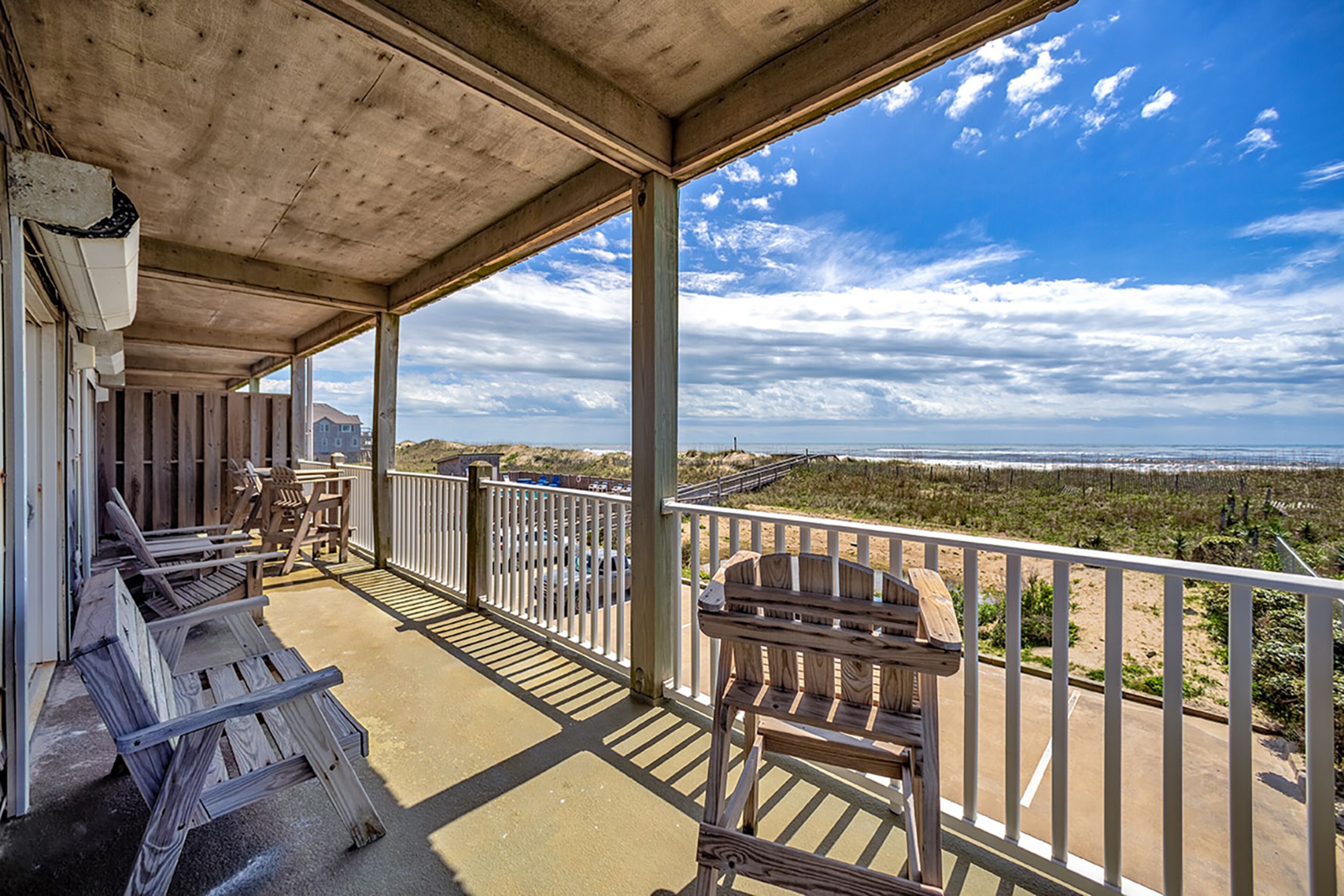 Oceanfront condo with wraparound balcony, fast WiFi, and on-site pool/hot tub