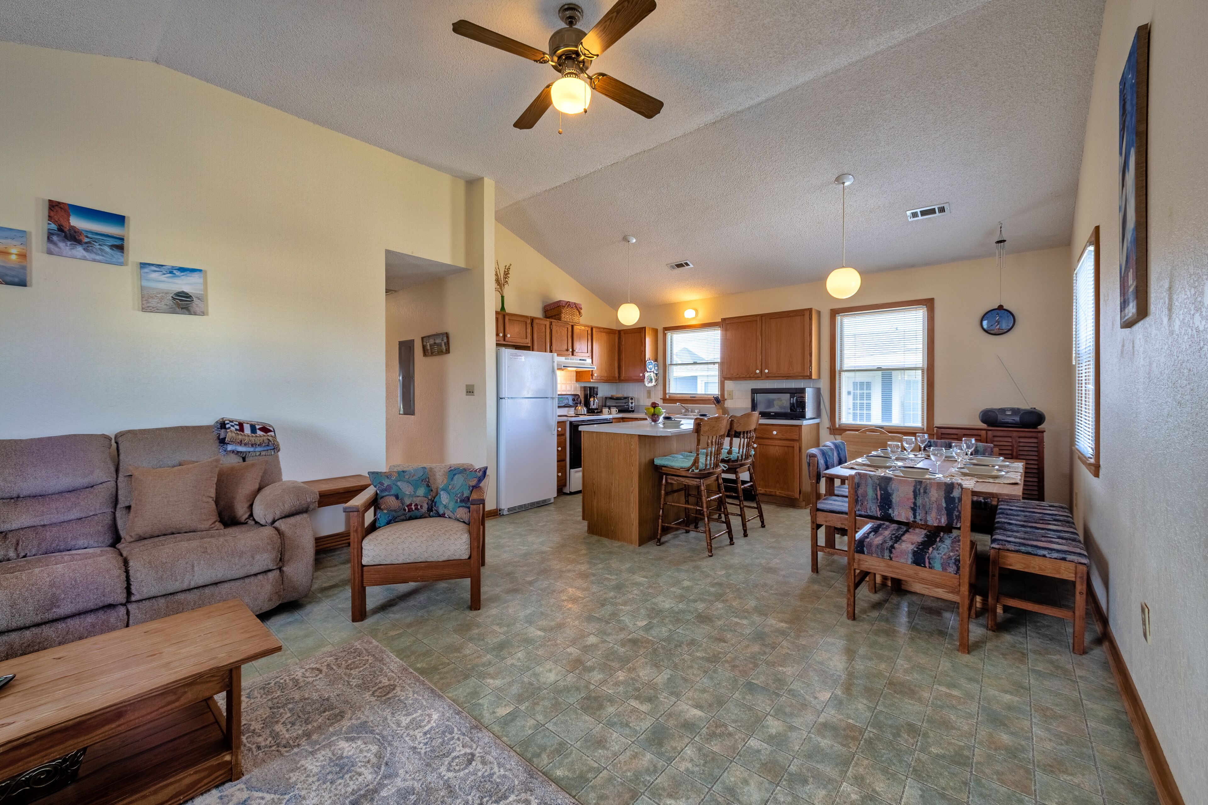 Dog-friendly home steps from the beach with deck, WiFi, AC & great location