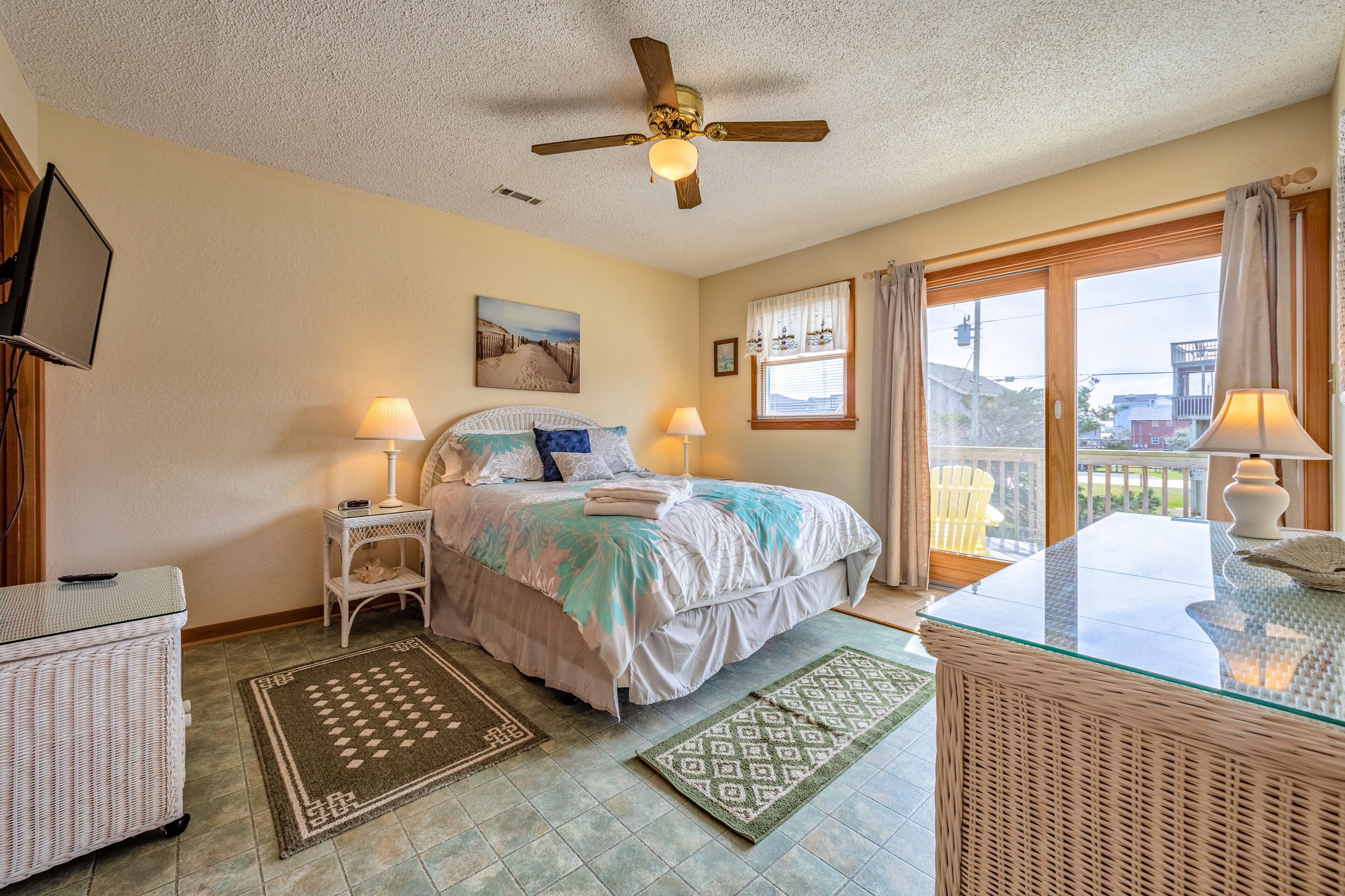 Dog-friendly home steps from the beach with deck, WiFi, AC & great location