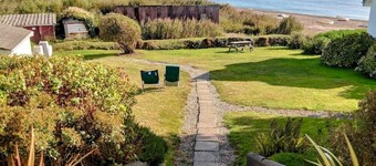 Beach Front Coastal Retreat with Sea Views