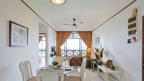 Traditional Apartment | Living area | 60-inch Smart TV with digital channels, Netflix, streaming services - Mahkota Jonker Melaka By I Housing (Malacca City)