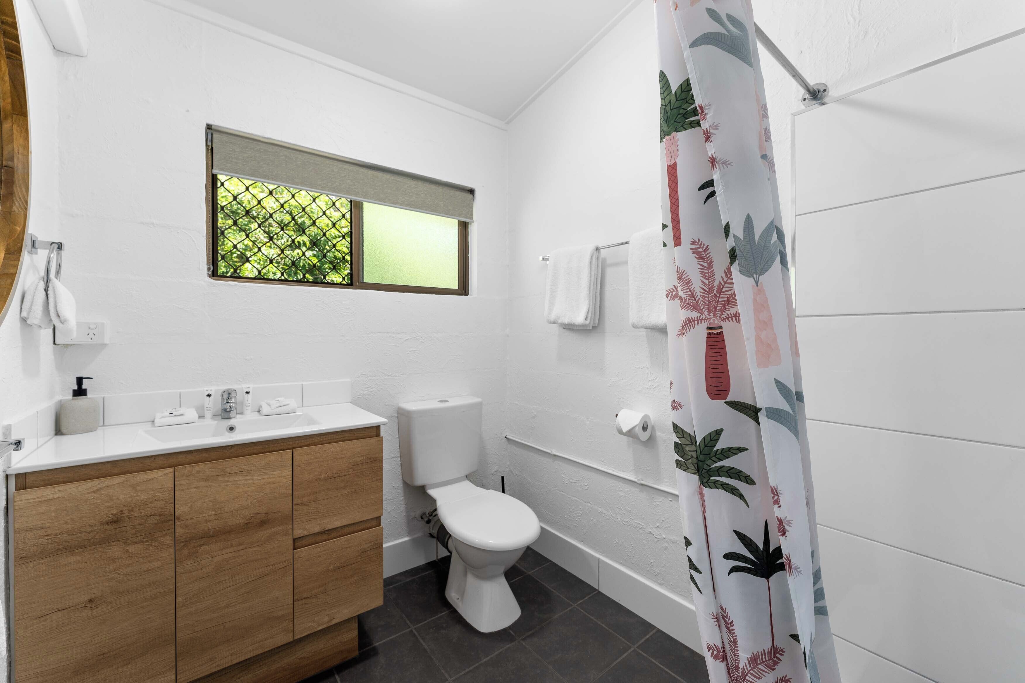 Shower, hair dryer, towels