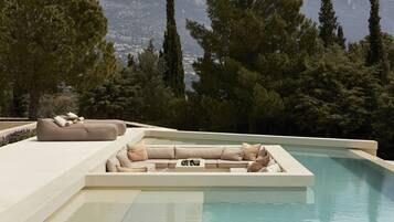 Outdoor pool, pool umbrellas, pool loungers