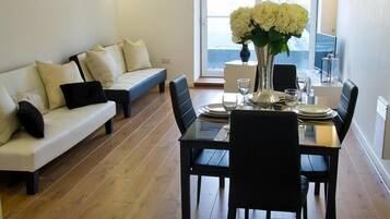 Basic Apartment | Living area | 40-inch Smart TV with digital channels, TV, Netflix