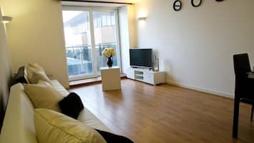 Basic Apartment | Living area | 40-inch Smart TV with digital channels, TV, Netflix