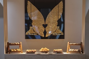 Daily buffet breakfast (EUR 18 per person)