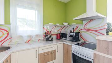 Apartment (Two Bedroom Apartment with Balcony an) | Private kitchen | Fridge