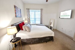 1 bedroom, desk, iron/ironing board, travel crib