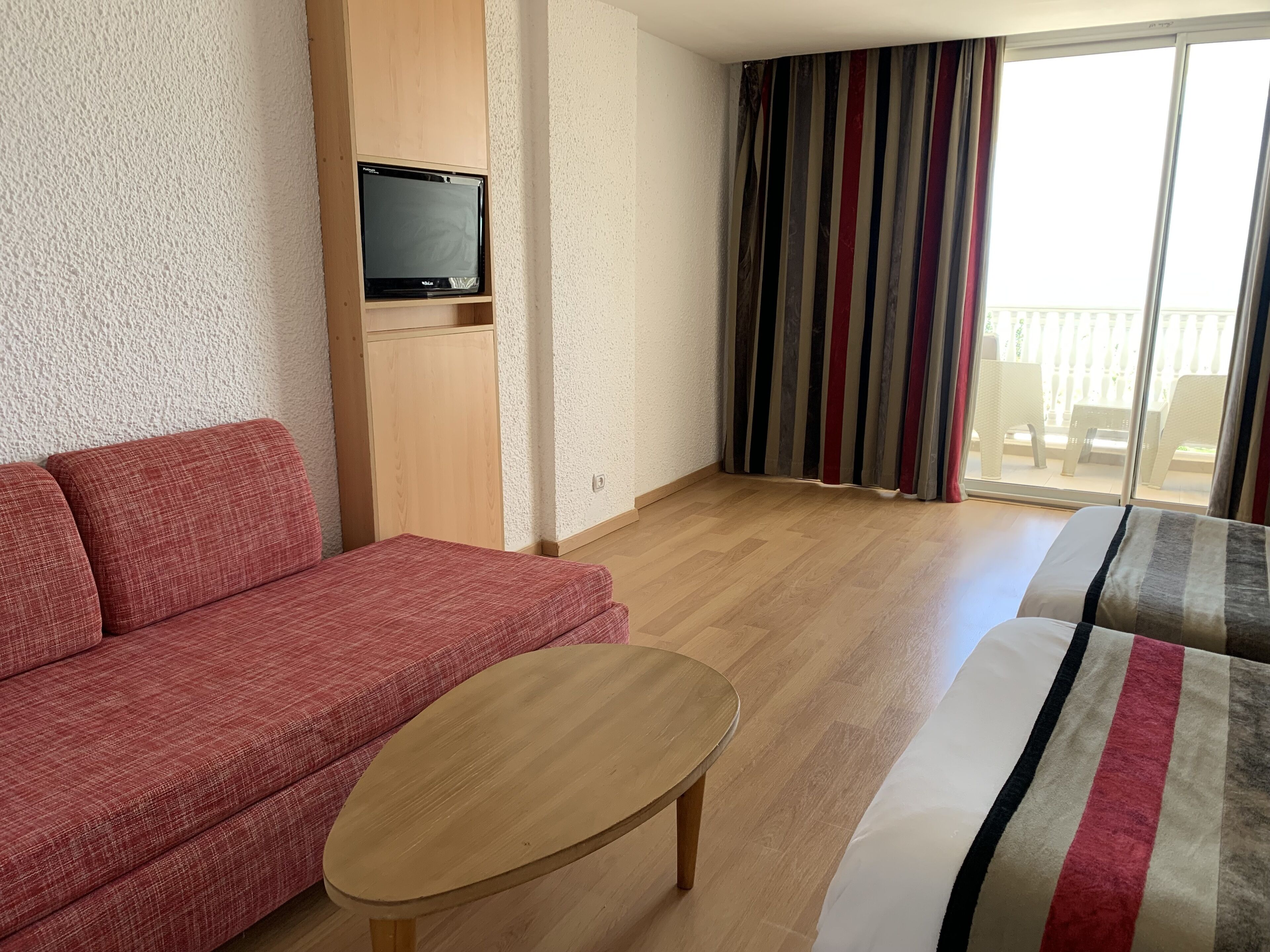 hypo-allergenic bedding, free minibar items, laptop workspace