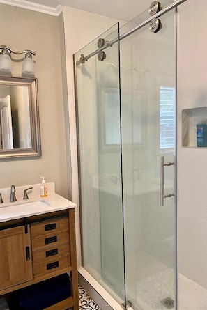Shower, hair dryer, towels, soap