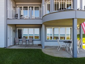 Outdoor dining - Water's Edge 1 | Beachfront Condo with Pool, Moments from Downtown (South Haven)