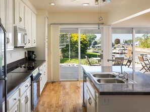 Fridge, microwave, oven, stovetop - All Decked Out | Breath-taking Riverfront Home with Unrivaled Lake Views (South Haven)