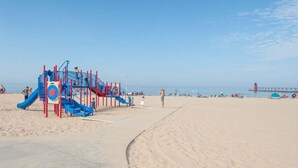 A beach playground with slides and climbing structures. - Beach Grass, 2 BR, South Haven, Walk to the Beach (South Haven)