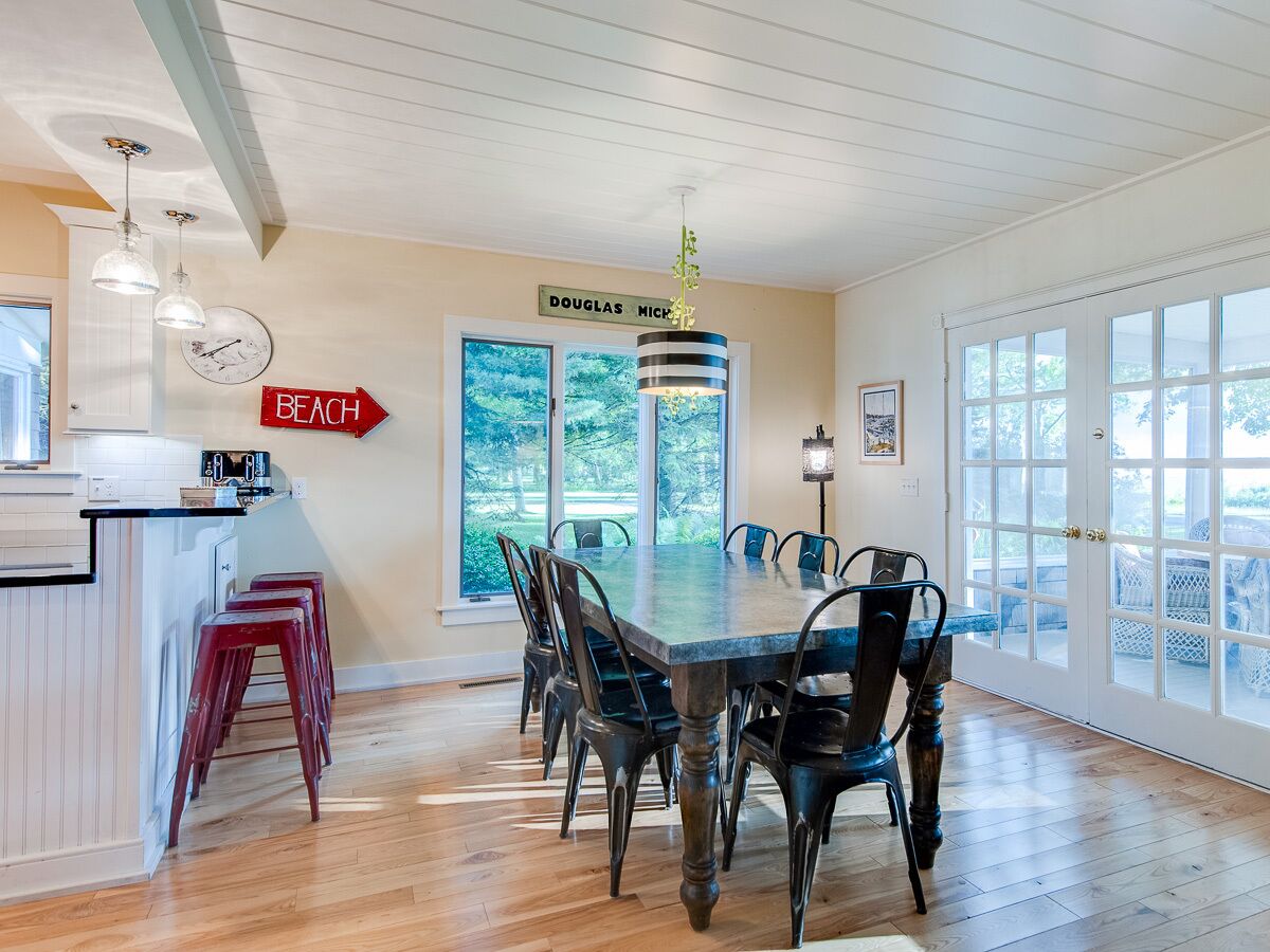 Knotty Pine | Secluded Woodland Retreat Overlooking Lake MI, w/ Fenced-In Porch