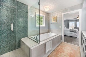 Bathtub, hair dryer, towels