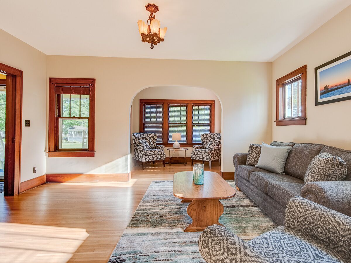 Vibrant Summer Home with Private Fire Pit, Moments to Downtown and the Lake