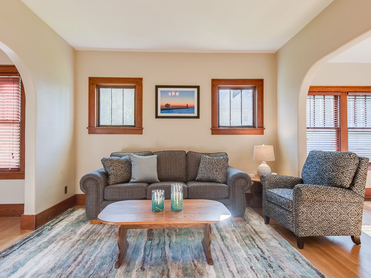 Vibrant Summer Home with Private Fire Pit, Moments to Downtown and the Lake