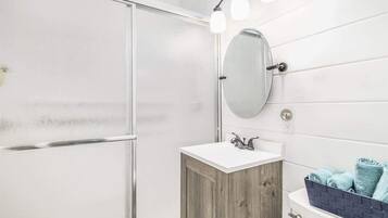 Bathtub, hair dryer, towels