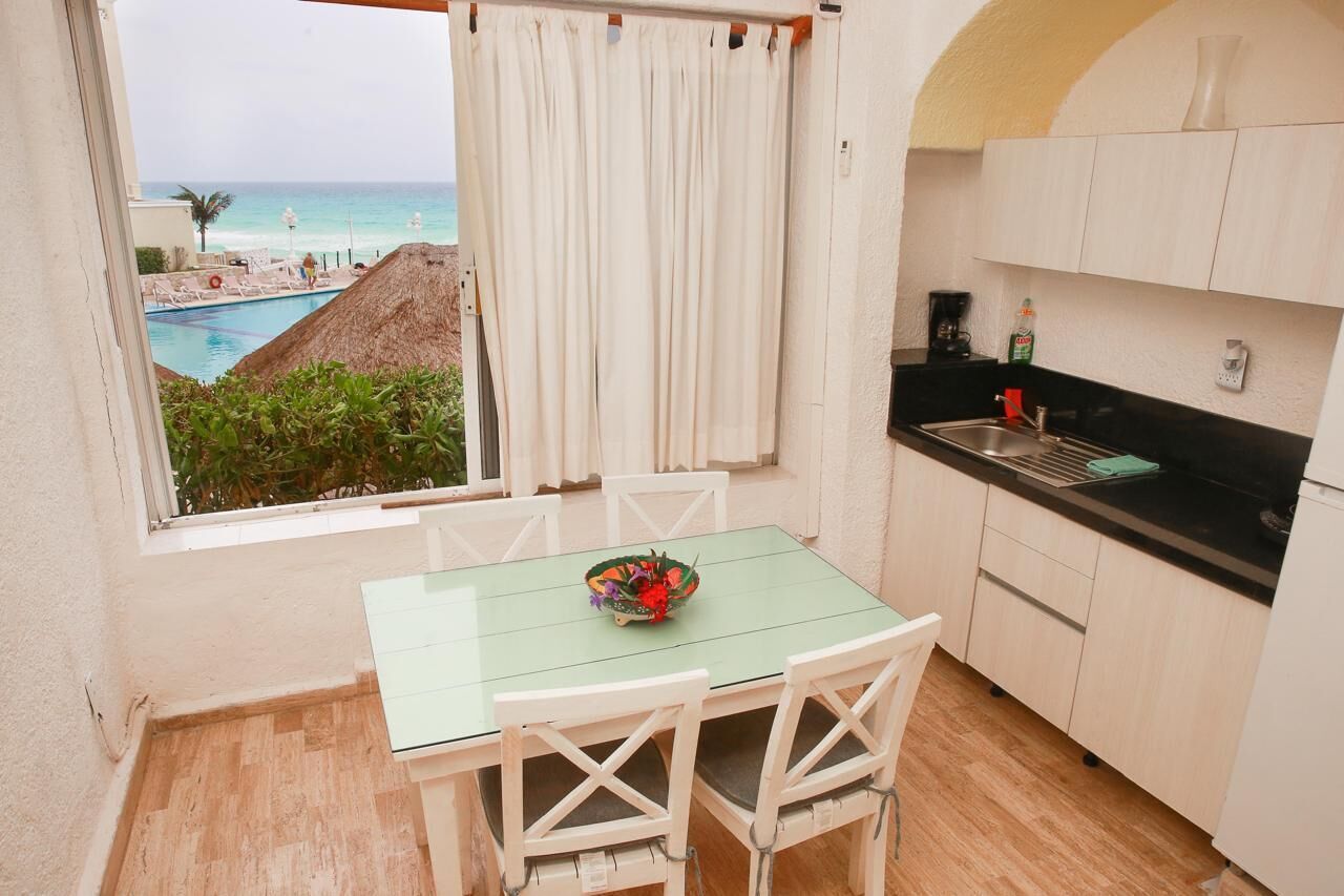 Basic Studio, 2 Double Beds, Pool View, Ground Floor | Private kitchen | Mini-fridge, microwave, coffee/tea maker, electric kettle