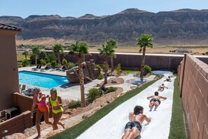 Outdoor pool, a heated pool - Large 9 Bedroom Home w/Private Pool, Indoor Sports Court & Arcade Room (Hurricane)