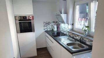 Refrigerador, horno, placa de cocina, lavavajillas