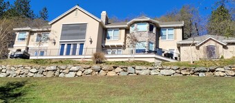 Private apartment attached to three story hillside home