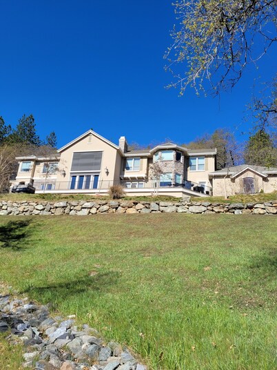 Private apartment attached to three story hillside home
