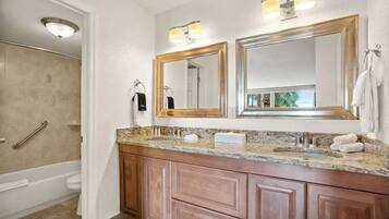 Combined shower/tub, hair dryer, towels, shampoo