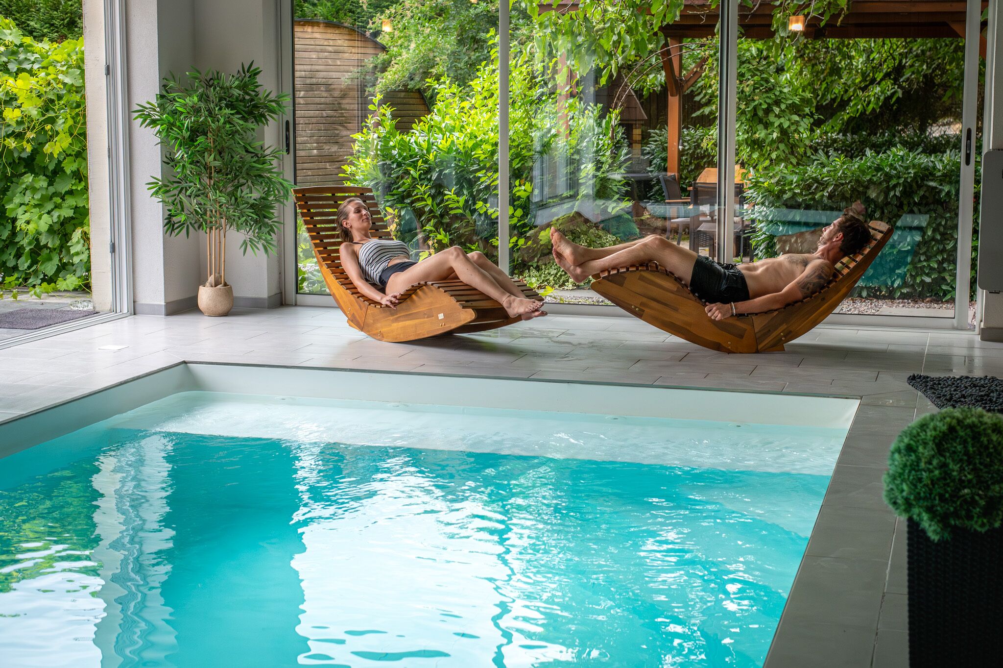 Indoor pool, a heated pool, sun loungers
