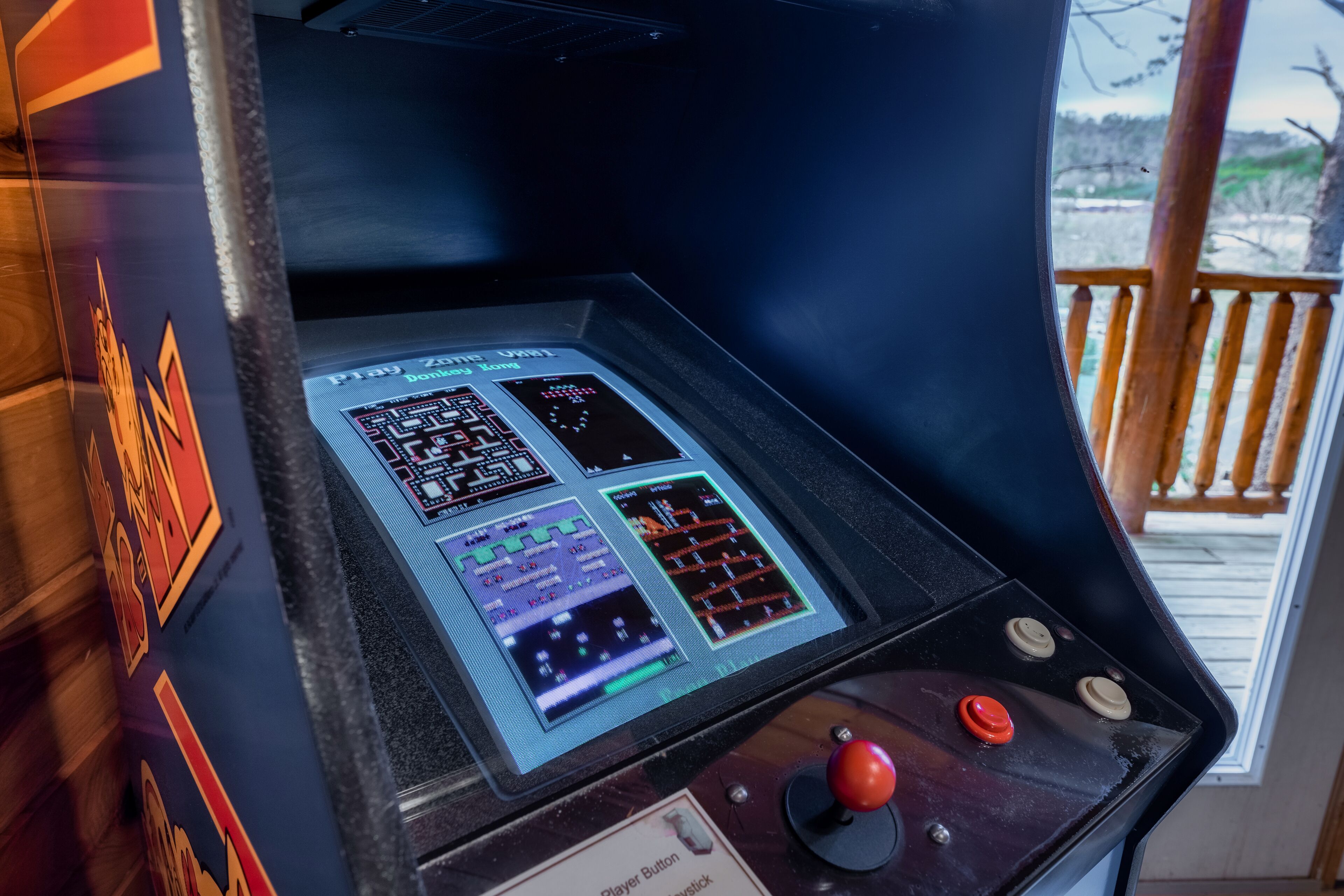 A control panel with multiple screens and buttons, likely for a ride or attraction.