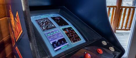 A control panel with multiple screens and buttons, likely for a ride or attraction.