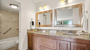 Combined shower/bathtub, hair dryer, towels, shampoo