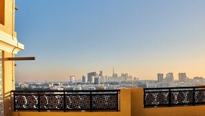 A cityscape view from a balcony with a geometric railing. - Carlton Dubai Creek (Dubai)