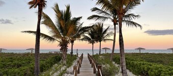 Oceanfront Penthouse Oasis— Stunning Balcony Views, Pool, Hot tub & Paddleboards