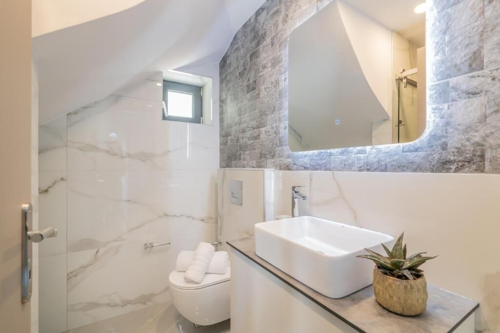 Villa Olive Green is new modern stone house