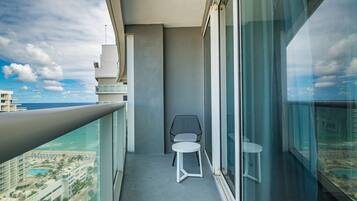 Luxury Suite, 2 Bedrooms, Kitchen, Partial Ocean View | Balcony