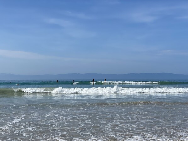 On the beach, sun loungers, beach towels