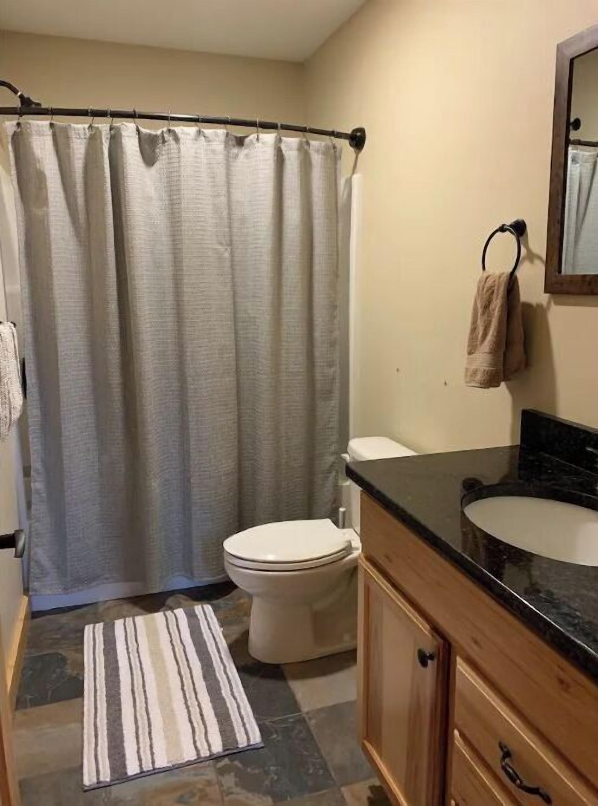 Combined shower/tub, hair dryer, towels, soap