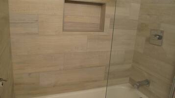 Combined shower/bathtub